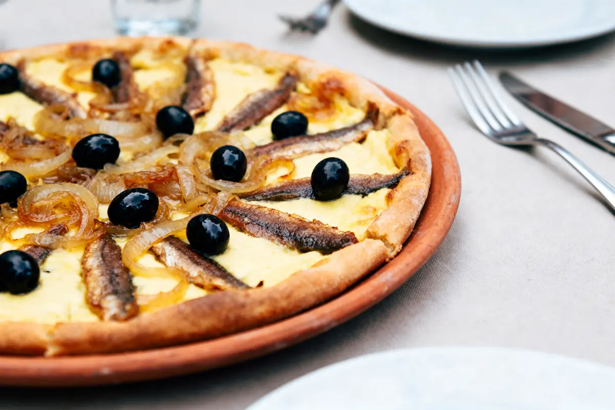 Recette pissaladière : La tradition niçoise révélée!
